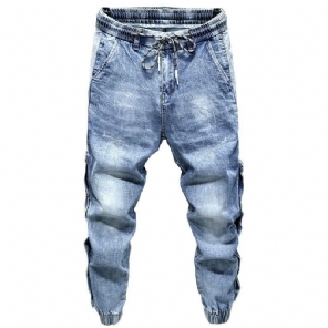 Heren Jeans Joggerjeans Met Stretch Aan De Zijkant En Klinknagels