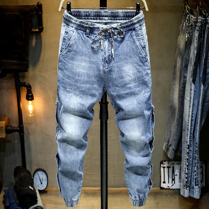 Heren Jeans Joggerjeans Met Stretch Aan De Zijkant En Klinknagels